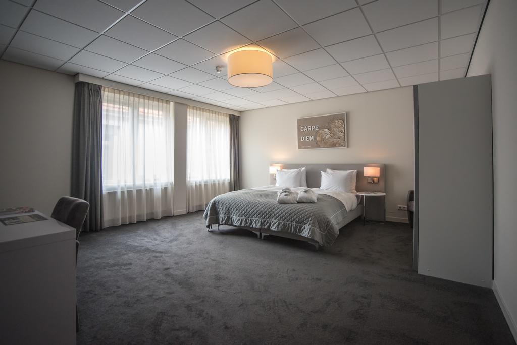 Hotel Het Raedthuys Синт-Мартенсдейк Экстерьер фото