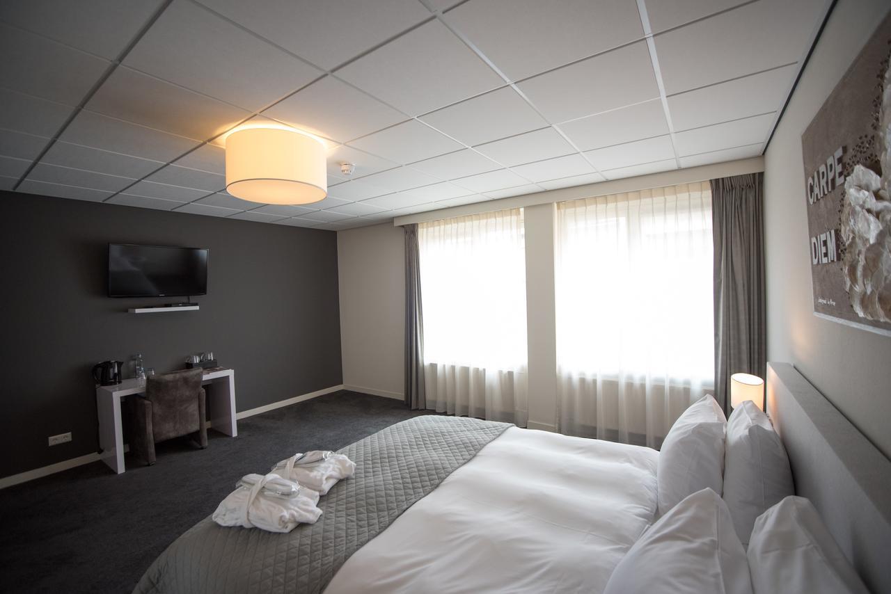 Hotel Het Raedthuys Синт-Мартенсдейк Экстерьер фото